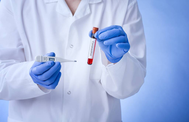 Positive blood test result for the new rapidly spreading Coronavirus, Coronavirus 2019-nCoV Blood Sample. Corona virus outbreaking. Epidemic virus Respiratory Syndrome. - Photo, image