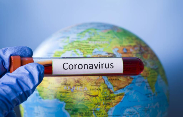 Coronavirus. Covid-19. Coronavirus Pandemic. Coronavirus2019. Earth with text concerning the Coronavirus Pandemic. - 写真・画像