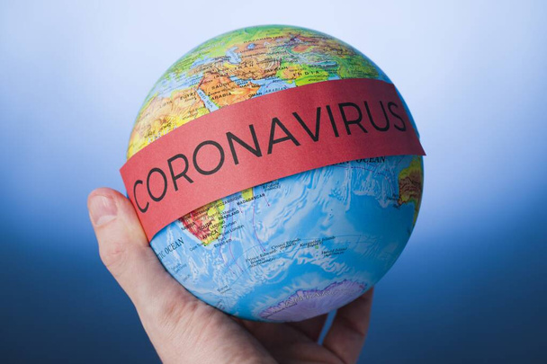 Coronavirus. Covid-19. Coronavirus Pandemic. Coronavirus2019. Earth with text concerning the Coronavirus Pandemic. - Fotoğraf, Görsel