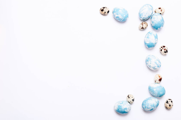 Stylish eggs with ombre blue marble stone effect on white background - Zdjęcie, obraz