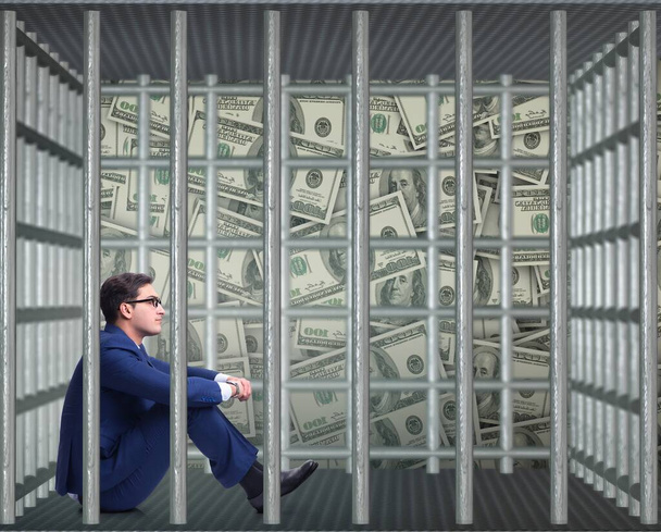 Mann mit Dollars im Gefängnis gefangen - Foto, Bild