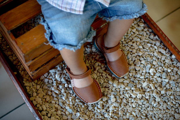 Little boy wearing leather sandals - Photo, Image