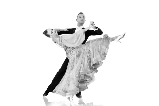 ballrom dance couple in a dance pose isolated on black background - Фото, зображення