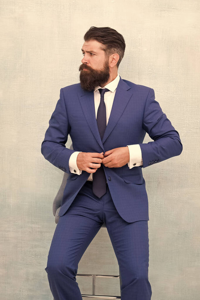 Bring chic and fashionable tone to office wear. Bearded man button fashionable suit jacket. Fashionable look of busy man. Fashionable office wardrobe. Fashion and style - Foto, Bild