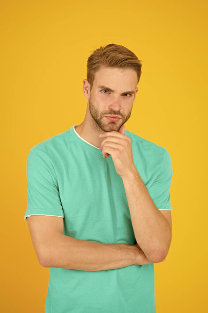 he is so confident. guy sexy and stylish bristle. handsome man unshaven face. sexy guy yellow background. Male barber care. summer male fashion. Hair and beard care. macho man charismatic look - Foto, imagen