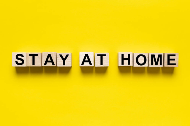 Stay at home text on wooden blocks - Photo, Image