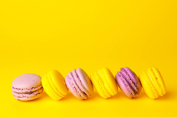 Tasty macarons on color background - Фото, зображення