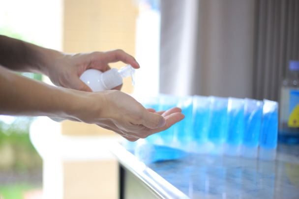 Corona virus prevention. rubbing Hand with sanitizer gel for hygiene and prevent and protection from infection plague covid-19 virus outbreak . - Photo, Image