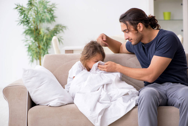 Father taking care of his ill daughter - Photo, Image