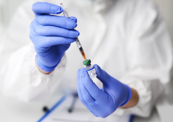 Coronavirus cure in a test tube - Foto, Imagen