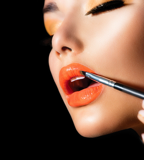 Professionelles Make-up. Lipgloss. Lippenstift - Foto, Bild