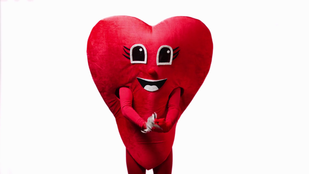 persoon in hart kostuum holding stick met veren geïsoleerd op wit - Video