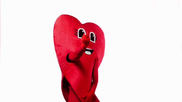 person in heart costume showing middle fingers isolated on white - Footage, Video