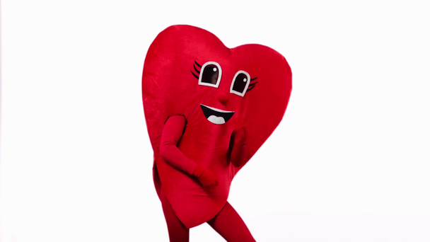 person in red heart costume dancing isolated on white - Footage, Video