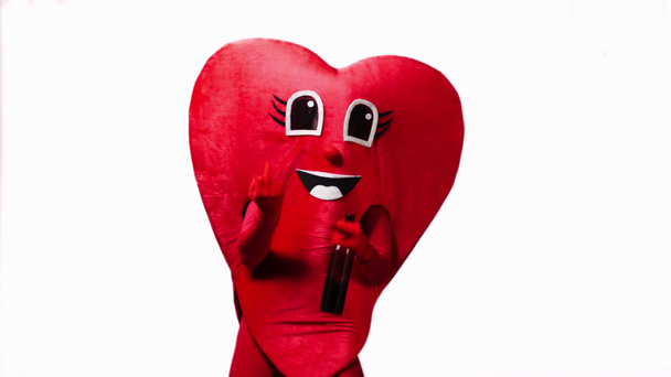 one person in heart costume showing middle finger isolated on white - Footage, Video