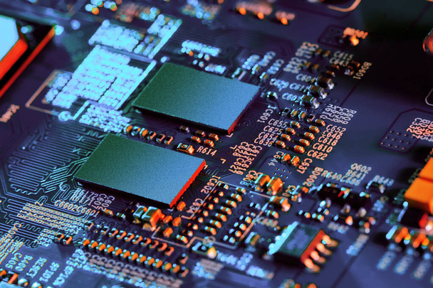 Electronic circuit board with electronic components such as chips close up.  - Valokuva, kuva