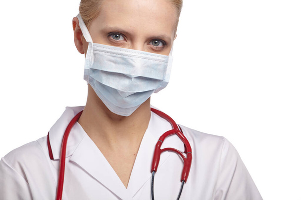 Woman doctor wearing medical anti virus mask. isolated studio portrait. - Valokuva, kuva