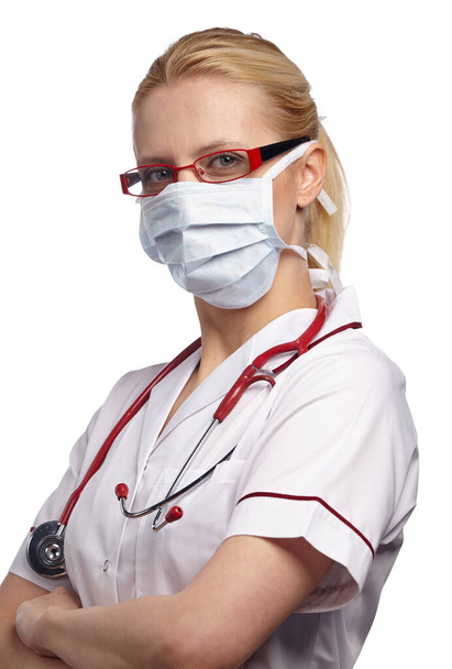 Woman doctor wearing medical anti virus mask. isolated studio portrait. - Φωτογραφία, εικόνα