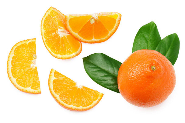 sliced orange with green leaf isolated on white background top view - Foto, Imagem