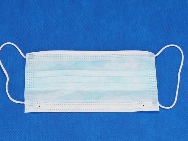 antiviral medical mask for protection against viruses. Surgical protective mask. - Photo, Image