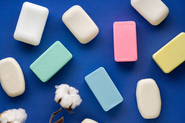 Various soap bar on a colored background - Photo, image