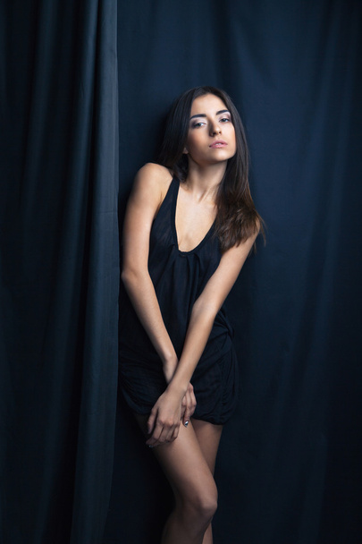 Sensuall woman in underwear, dark background - Fotó, kép