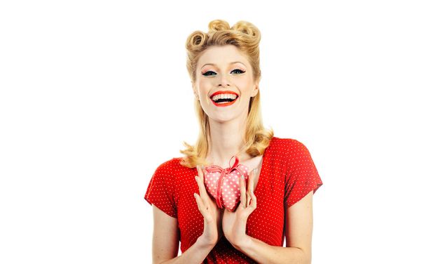 Portrait of girl holding red heart isolated on white background. - Zdjęcie, obraz