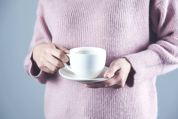 woman hand holding cup of tea or coffee - Foto, Imagem