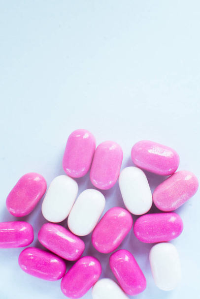 Pills multi-colored macro. Coronavirus vaccine concept. Healthcare - Fotó, kép