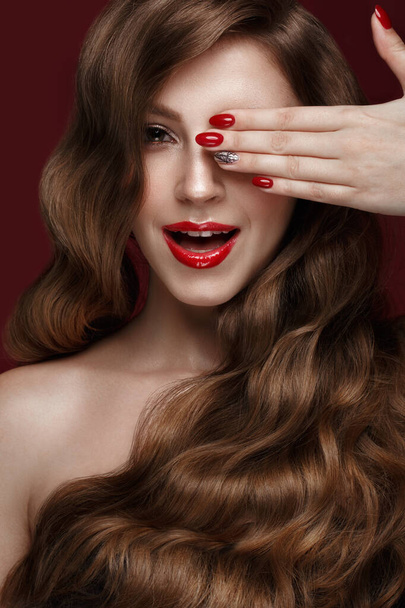 Beautiful girl with a classic make up, curls hair and red nails. Manicure design. Beauty face. - Fotoğraf, Görsel