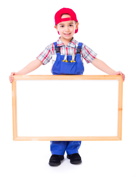 Little handyman showing blank billboard - 写真・画像