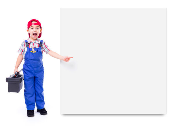Little handyman showing blank billboard - Фото, изображение