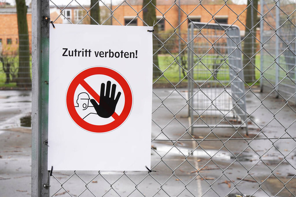 Closed sports ground with prohibition sign Zutritt verboten - meaning no entry in German - Photo, Image