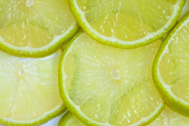 Citron vert tranché juteux frais - fond d'agrumes
 - Photo, image