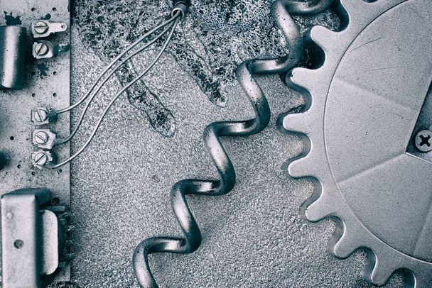 Ασημένιο γκρι γρανάζι και τροχοί δημιουργούν ένα βιομηχανικό φόντο steampunk - Φωτογραφία, εικόνα