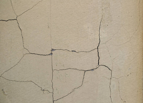 cracked stucco background. pink yellow color  - Photo, Image