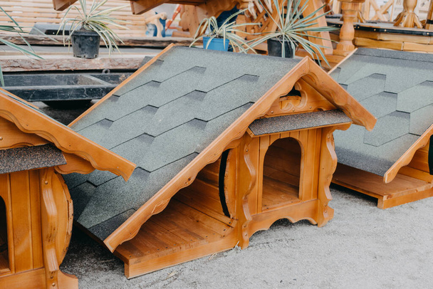Modern eco friendly wooden doghouse on shop, market. - Photo, Image