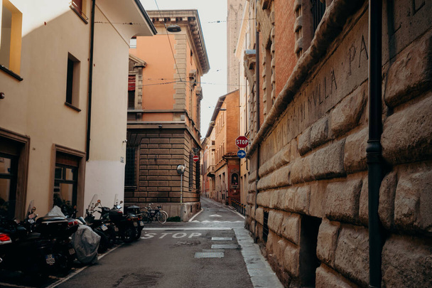 Bologna, Italy - September 30, 2019: Street of sunny Bologna - Fotó, kép