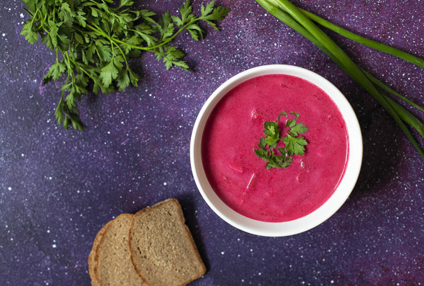 Cold Creamy Beetroot Soup, Beetroot Gazpacho Served in a Rustic Clay Bowl with Bread and Fresh Herbs. Rustic Background. Vegetarian, Clean Eating Food Concept. Copy Space. Close up - Photo, Image