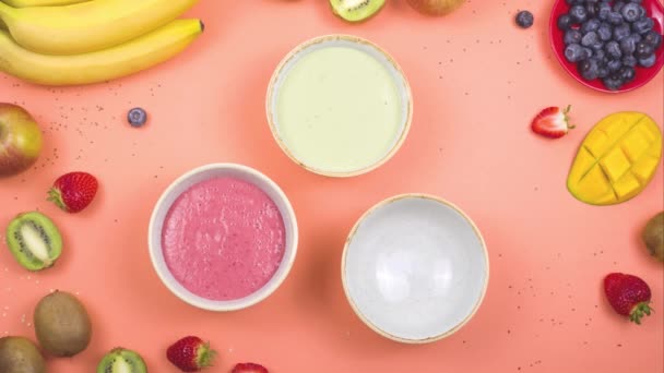 Vegetarian healthy food made from multi-colored smoothies. Stop motion. - Footage, Video