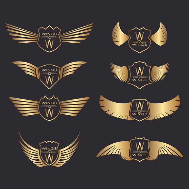 Golden wings with shields. Symbols of sports or business achievements. Vector. - Vector, Image