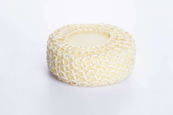 Bright bath sponge on a white background. Isolated. - Photo, Image