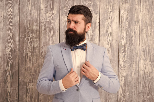 Gentleman style barber. Barber shop offer range of packages for groom make his big day unforgettable. Barber shop concept. Beard and mustache. Guy well groomed handsome bearded hipster wear tuxedo - Фото, изображение