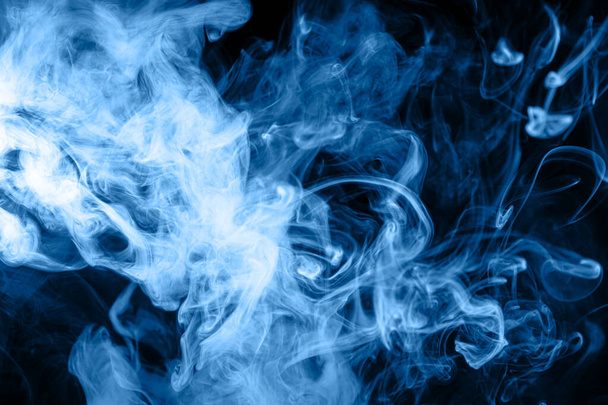 close up of colorful steam smoke in mystical and fabulous forms on black background.Mocap for ar - Photo, Image