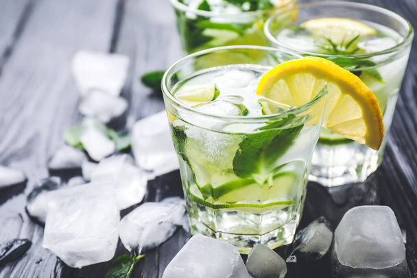 Glasses of fresh lime lemonade on table - Photo, Image