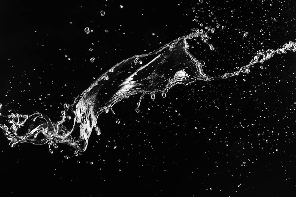 Splash of clean water on dark background - Photo, Image