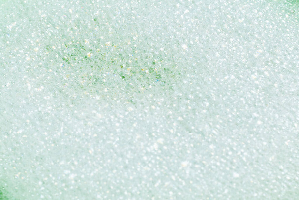 Green lather background, top view. Copy space.  - Photo, Image