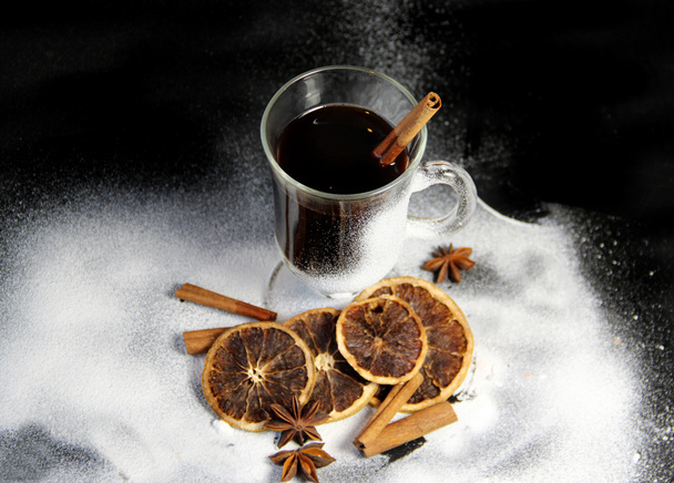 Traditional Christmas punch on the black background - Foto, imagen