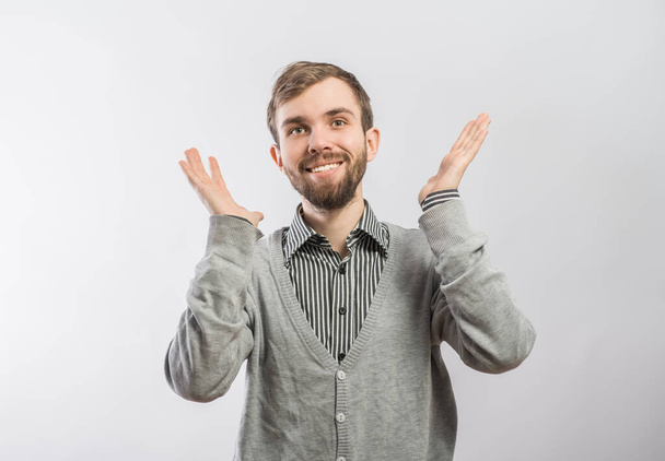 young casual man with a smile on his face and his arms wide open - Foto, immagini