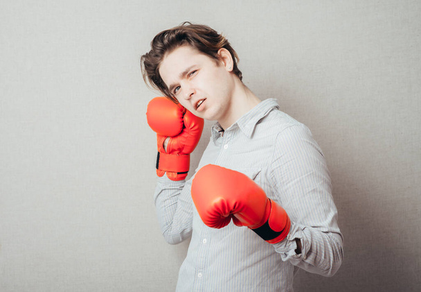 Business man ready to fight with boxing gloves  - Фото, изображение